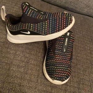 Rainbow slide on Nike sneakers